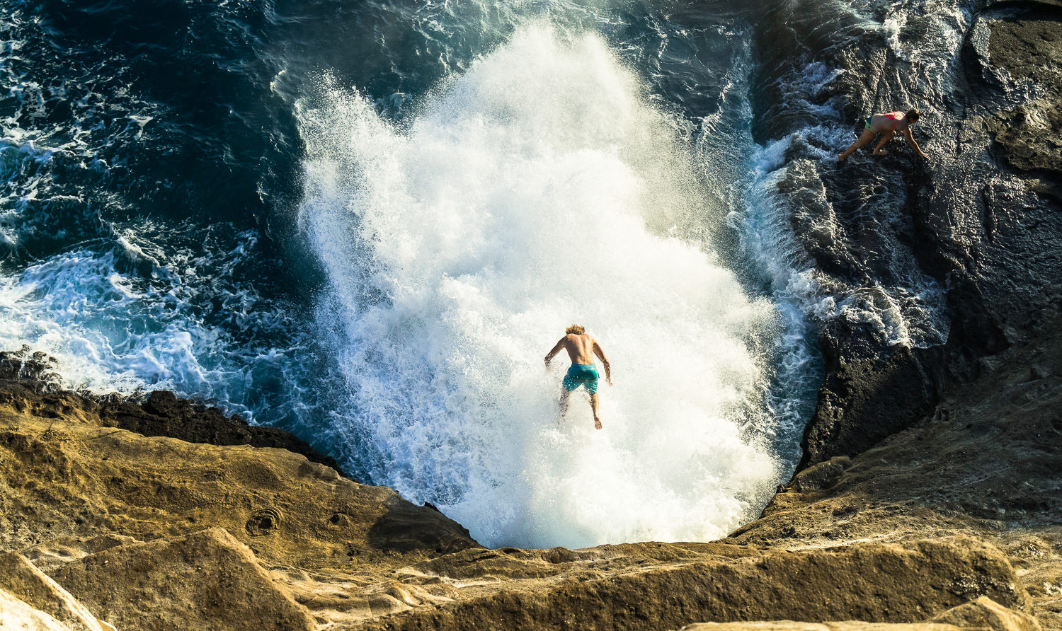 Spitting cave cliff jumping on oahu hawaii.