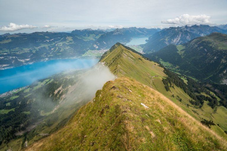 a person standing on top of a mountain.