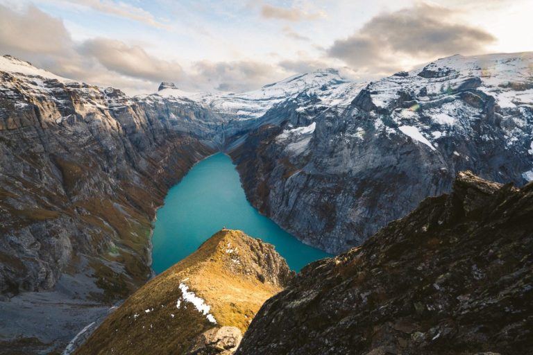 a large body of water sitting on top of a mountain.