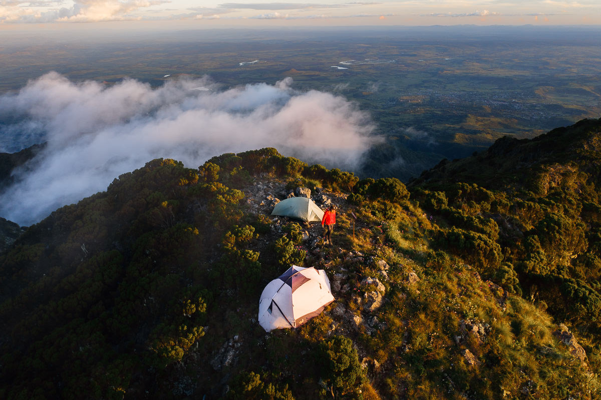 a group of tents sitting on top of a mountain