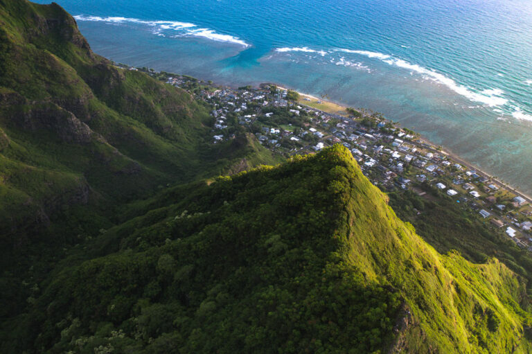 an aerial view of a small town on a mountain