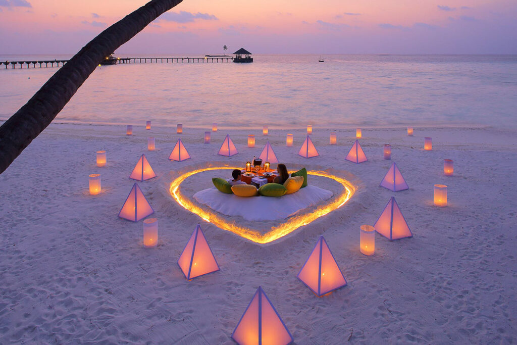 a heart shaped light up on the beach