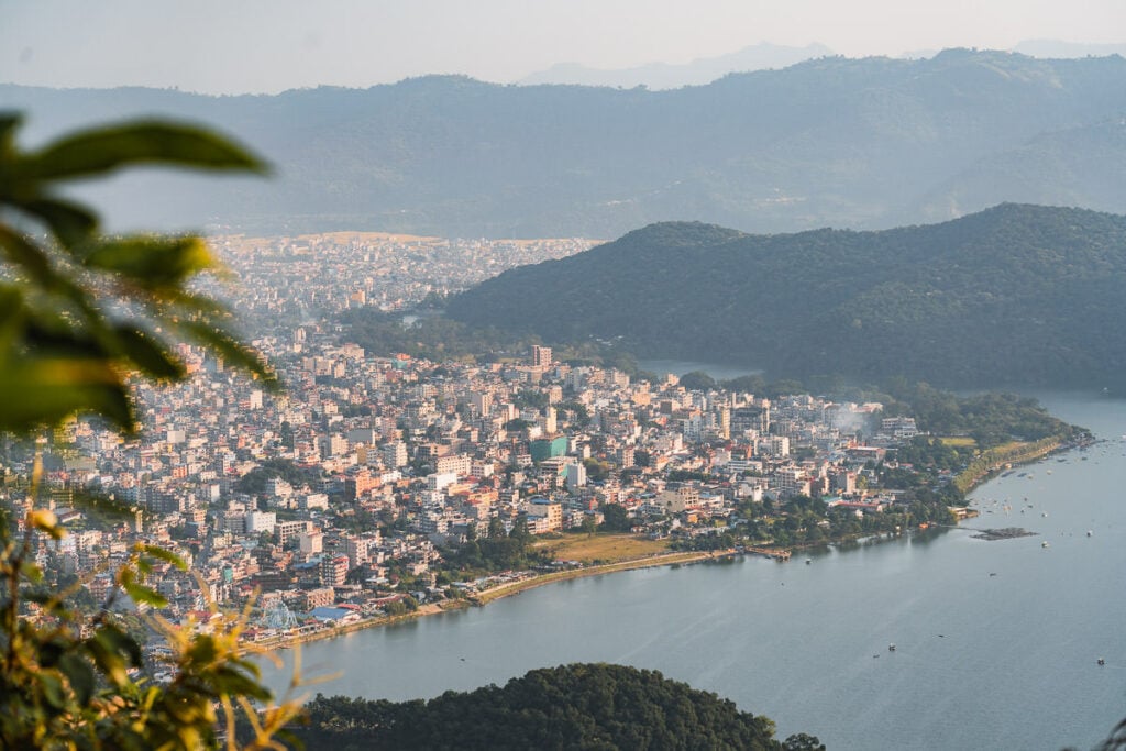 a large body of water surrounded by a city
