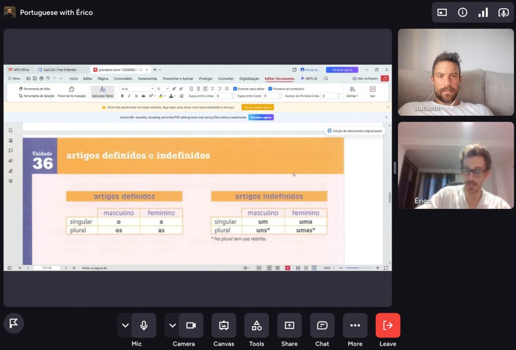 Two people are in a video call labeled “Portuguese with Érico,” sharing a screen that displays a grammar lesson on definite and indefinite articles in Portuguese.